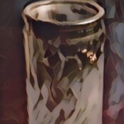 A glass-encased candle